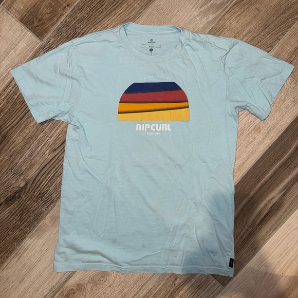 Rip Curl Other - Rip Curl Light Blue Tee with Multicolor Graphic EUC Mens XS/boys 16